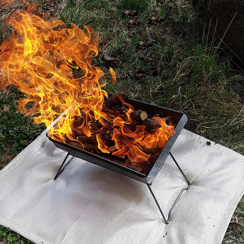 Fire pit on 40 Inch Fire Pit Mat For Deck And Grill, Fiberglass Insulated Under Stove Pad With 940F Safety, on outdoor grass