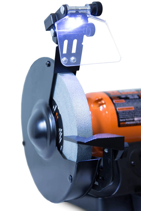 Close-up of Eight Inch Bench Grinder Powered By A Beefy Four Point Eight Amp Motor Hitting 3450 RPM with adjustable LED eye guard.