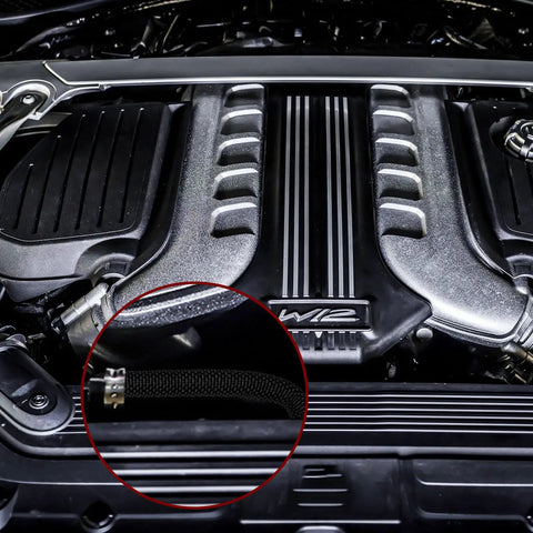 Close-up of engine bay with Pro Grade High Temp Braided Wire Loom for cars, black, showing braided texture and fit.