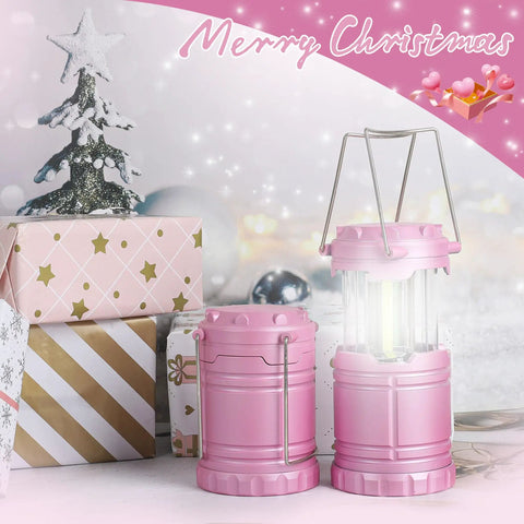 2 Pack Mini LED Pink Camping Lanterns Portable Outdoor Handheld Lights for Camping Hiking Power Outages and Emergencies Durable ABS Construction for Long Lasting Use with Christmas gifts in background