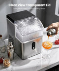 Solid Countertop Nugget Ice Maker Goes Hard On Rapid Cooling Spits Out Hella Chewable Pebble Chunks Quickly Generates Thirty Five Pounds Daily For Any Setup on a marble countertop pouring a cocktail.