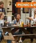 Grill Caddy With Plate Holder And Paper Towel Holder For Outdoor Cooking And Picnics on a picnic table with people enjoying a meal