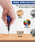 WORKPRO automatic center punch with blue head and knurled black handle, used on wood.
