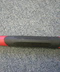 Close-up of Forged Adze With Fiberglass Handle Built Tough For Real Garden Pros, focusing on red and black grip.