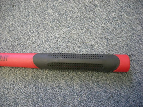 Close-up of Forged Adze With Fiberglass Handle Built Tough For Real Garden Pros, focusing on red and black grip.