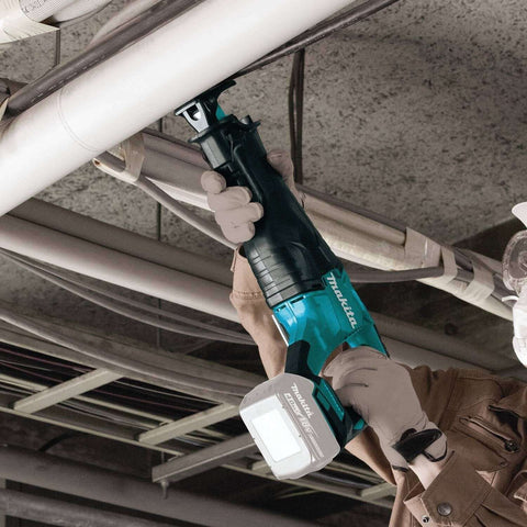 Worker using 18V LXT Brushless Cordless Reciprocating Saw Tool Only With Variable Speed Trigger And Toolless Blade Change for piping