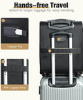 Back view of underseat carry on luggage attached to rolling suitcase, showing luggage tag and strap for hands-free travel.