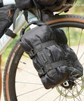 6.5L Waterproof Front Fork Bike Bag With Roll Top Closure For Road Gravel And MTB Universal Mount Fits Forks With Or Without Mounting Holes Durable Tear Resistant 210D Lining Keeps Your Gear Totally Dry On Wet Rides attached to bike