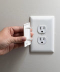 Inserting StayPut Double Outlet Plug Cover Set For All Outlets Kid Safe And Hard To Remove One Plug Covers Both Outlets For A Clean Look