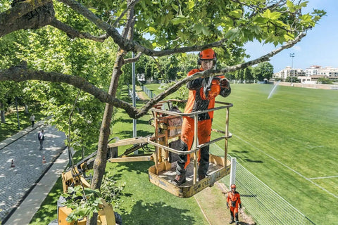 Worker using Top Handle Gas Chainsaw 12 Inch Bar 35.2cc Workhorse Pro Grade Compact Saw for pruning tree branch