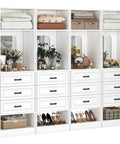 100 Inch White Freestanding Closet System With Smooth Glide Drawers And Full Length Mirrored Panel, organized with shoes and decor.