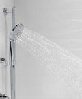 Forte All-In-One Handshower Kit With Slide Bar And 60-Inch Hose spraying water in polished chrome finish