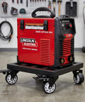 Heavy Duty Metal Air Compressor Cart With Dual Locking Caster Wheels Holds Eight Hundred Pounds with welder on it in workshop.
