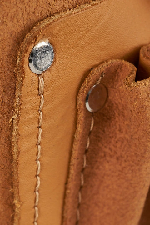 Close-up of stitching on the Genuine Leather Tool Pouch for Electricians With Multiple Pockets and Belts Up to Three Inches Wide Pro Grade