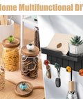 Home DIY hooks with assorted ceramic pumpkin knobs, including orange, on wooden shelf and glass jar lids in kitchen decor.