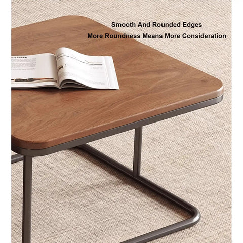 Modern Square Nesting Coffee Table Set Of Two Industrial Stacking Side Tables With Storage Drawers Solid Wood Accent Furniture For Living Room close-up of rounded edge table with magazine on top.