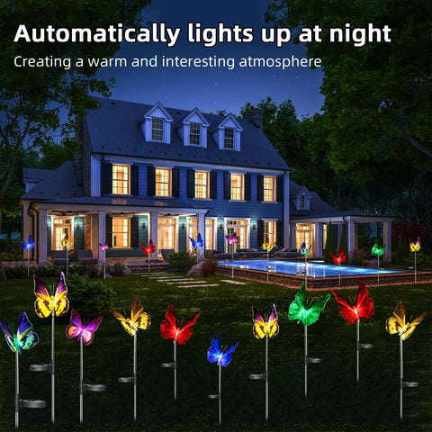 3 Pack Solar Butterfly Garden Lights Waterproof Led Color Changing Stakes illuminating yard at night with house in background