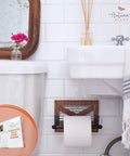 Rustic Farmhouse Toilet Paper Holder Wall Mount In Warm Brown Wood With Galvanized Metal And Black Finish For Western Style Bathroom Decor And Down Home Country Vibe, displayed in a styled bathroom scene.