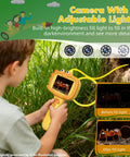 Dope Kids Borescope Camera With Light For Real Time Exploration And 1080P Live Video, A STEM Toy For Ages 3 To 10, The Ultimate Gift For Outdoor Adventures And Nature Discovery, child using yellow camera in grass
