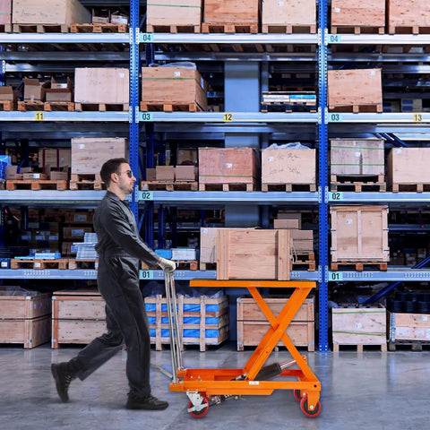 Heavy Duty Hydraulic Lift Table Cart With 500 Pound Capacity And 28.5 Inch Max Rise used to transport wooden crate in warehouse.