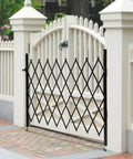 Heavy Duty Folding Security Gate With Lockable Diamond Grid Panels Expandable Wall Mount Kit For Garage Basement And Storefronts Steel Build gate in black with diamond pattern.