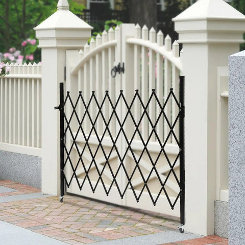 Heavy Duty Folding Security Gate With Lockable Diamond Grid Panels Expandable Wall Mount Kit For Garage Basement And Storefronts Steel Build gate in black with diamond pattern.