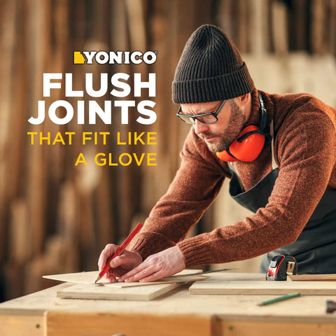 Craftsman measuring wood using Tongue And Groove Router Bit Set Pro Grade For Three Quarter Inch Stock With One Half Inch Cutting Depth.