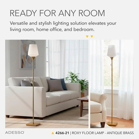 Roxy Tall Floor Lamp in Brushed Steel With White Opal Glass, 71 Inch Height in living room with couch and plant