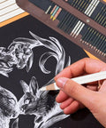 Complete 31 Piece Drawing Pencils Kit With Graphite Pencils 6H To 12B Charcoal Pencils White Color Pencils in use on art paper
