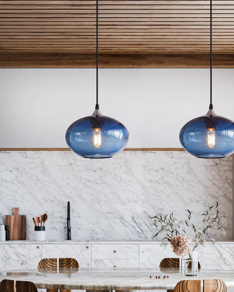 Pendant Lights Kitchen Island Hand Blown Glass UFO Ceiling Light Fixture With Seeded Bubbles above a modern kitchen counter