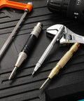 Solid Precision With This Hella Tough Tungsten Carbide Scriber And Automatic Spring Loaded Center Punch Set Featuring Built In Magnet Clips For Etching Glass Ceramics Metal in a toolkit with marking tools and a wrench.