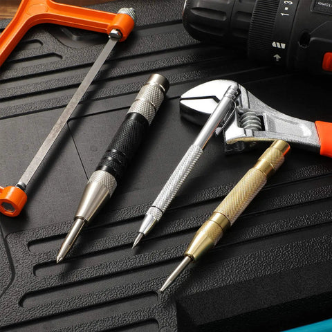 Solid Precision With This Hella Tough Tungsten Carbide Scriber And Automatic Spring Loaded Center Punch Set Featuring Built In Magnet Clips For Etching Glass Ceramics Metal in a toolkit with marking tools and a wrench.