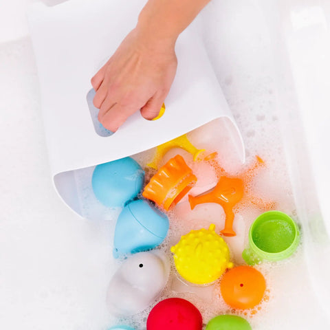 Freestanding Bath Toy Drying Bin With Quick Drain Base, Real No Mess Game Changer For Keeping Kids Toys Snappy And Mold Free, with toys in soapy water.