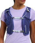 Front view of 15L Go To Hydration Pack Indigo And Reflective Silver OSFM One Size Fits Most Unisex Running Backpack on person