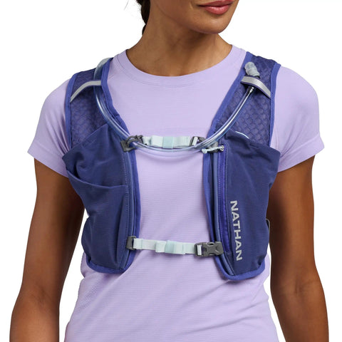 Front view of 15L Go To Hydration Pack Indigo And Reflective Silver OSFM One Size Fits Most Unisex Running Backpack on person
