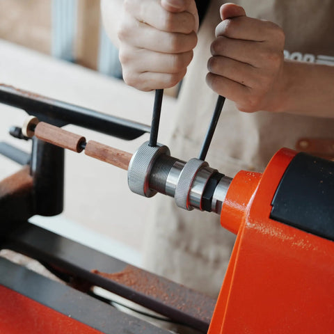 Crush Complex Turns On Your Lathe With This Badass ER32 Collet Chuck Kit Featuring Heavy Duty Base Five Precision Jaws being tightened on a lathe.