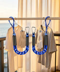 Elastic Bungee Dock Line For Boats, 4 Ft Mooring Rope With Stainless Steel Clip hanging on railing