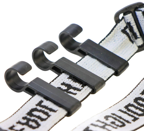 Close-up of black Heavy Duty Helmet Light Clips for Hard Hats and Safety Caps 50 Pack placed on a white strap for narrow edge headlamps
