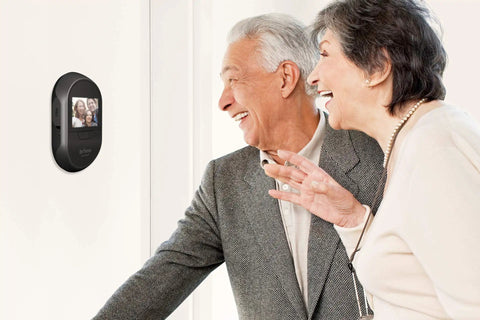 Elderly couple using Front Door Peephole Wireless Security Camera with Large Screen, Theft Proof Design, Long Battery Life