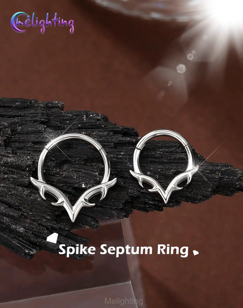 Two V Shaped 16G Septum Ring Clicker In 316L Stainless Steel With Wing Blade Piercing Jewelry displayed against dark background