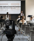 Smart PtZ Camera With 20x Optical Zoom And AI Auto Tracking Offers Crisp 1080p 60fps HDMI USB Output capturing a presentation in a conference.