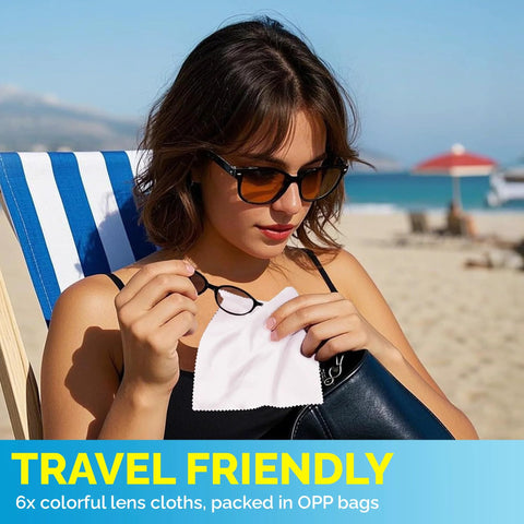 Microfiber cleaning cloth, white, 6x7 inches; used to wipe eyeglasses, held by beachgoer wearing sunglasses