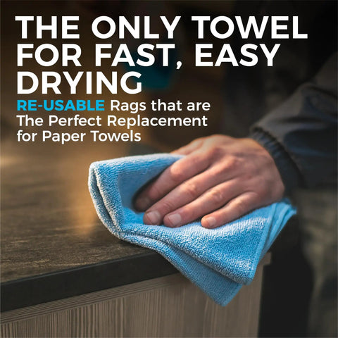 Hand using a blue microfiber towel to clean a wooden surface, text about reusable towels for fast drying visible.