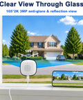 No Drills Necessary Two Pack 2K Window Security Cameras Indoor Home Surveillance For Round The Clock Ai Person Detection And Vivid Color Night Vision With Dual Band Wifi Recording And Solid Guard showing 105° view through glass with smartphone display.