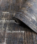 Metallic Textured Wallpaper in Black and Gold Industrial Distressed Vibe, showing roll detail in 20.8 in by 786 in size