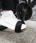 One Pair Velcro Bike Straps For Pedals on a white sneaker, nylon foot binding straps on bicycle pedal, secure grip
