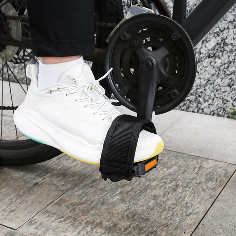 One Pair Velcro Bike Straps For Pedals on a white sneaker, nylon foot binding straps on bicycle pedal, secure grip