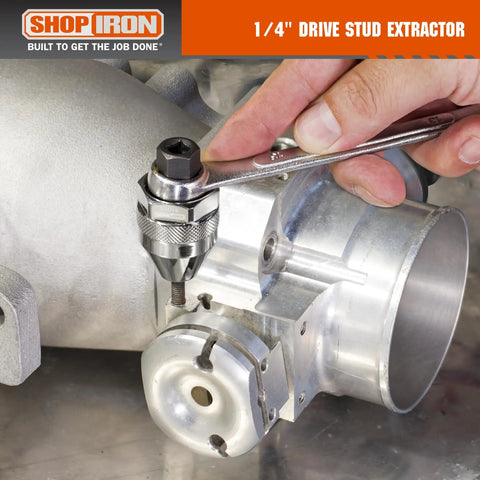 One Quarter Inch Drive Mini Damaged Bolt And Stud Extractor 51013 in use on engine component with hand tool.