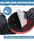 9 Inch 6 Hole Sanding Discs For Drywall Sander With Hook And Loop Backing shown being installed by gloved hands
