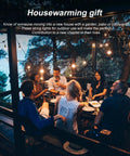 Group enjoying outdoor dinner with string lights on deck, using Outdoor String Light Poles 2 Pack 9 Ft Adjustable Pole And Bracket Kit.